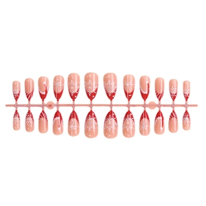 Christmas almond press-on nails set with red and white snowflake designs and bows