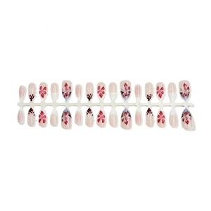 3D handmade almond press-on nails with red floral patterns and black polka dots design