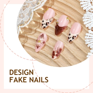 Handmade leopard print press-on nails with 3D floral accents and rhinestones