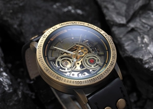 Macro shot of vintage skeleton mechanical watch with bronze case and leather rivet strap