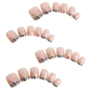 Short square nude nails with gold leaf patterns and rhinestone accents in a 24pc set