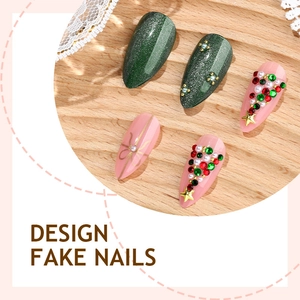 Handmade Christmas press-on nails with 3D rhinestone tree, bow, and green cat-eye finish