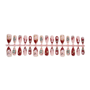 Faux ongles 3D Noël en forme d'amande avec motifs de rennes et sapins sur support