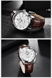 Gros plan d'une montre Benyar avec cadran blanc, guichet de date et bracelet en cuir brun