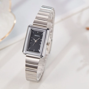 Silver rectangular quartz watch for women with black dial and metal strap in diagonal view