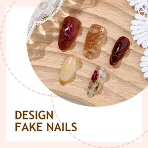 Handmade 3D autumn press-on nails with amber texture, dry flowers and gold stars