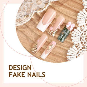 Handmade extra long french press-on nails with 3D floral accents and crystal bow decor