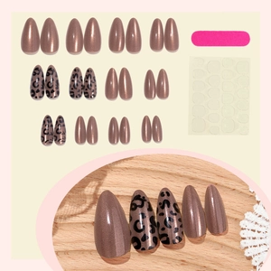 Cat eye almond press-on nails with leopard print, includes 24 pieces and tool kit