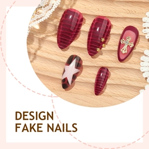Almond burgundy fake nails with crocodile texture and golden star accents
