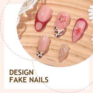 French almond press-on nails with leopard print, gold chains, and red floral designs
