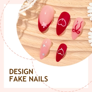 Almond fake nails with red heart and bow designs for Valentine's Day manicure