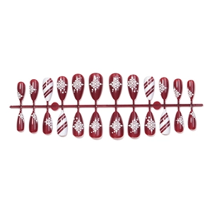 Festive almond fake nails set featuring red stripes and white snowflake Christmas designs