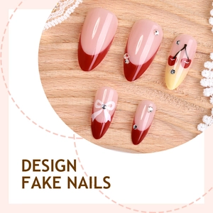 Almond fake nails with cherry patterns, white bows and diamonds in French style