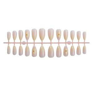 Almond-shaped gradient pink press-on nails with yellow floral patterns and gold beads