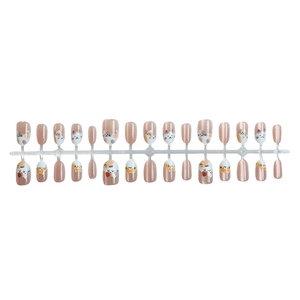 Cat eye press-on nails with cute cartoon cat patterns on a nude pink glitter base