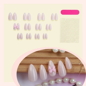 Pink gradient almond press-on nails set with 3D bows, nail file, and adhesive tabs