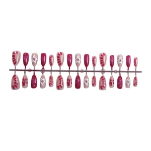 Pink almond fake nails set with 3D white flowers, pearls, and magenta striped design
