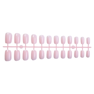 Glossy light pink medium square press on nails set with 24 pieces on a pink display rack
