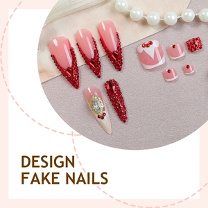 Coffret de faux ongles roses avec strass rouges luxueux et accents dorés, tailles variées
