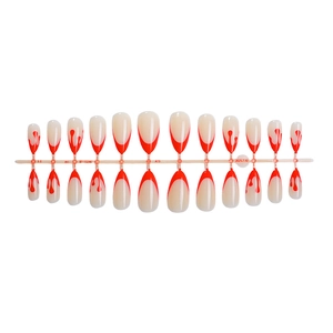 Almond-shaped Halloween press-on nails with red blood drip design on nude base