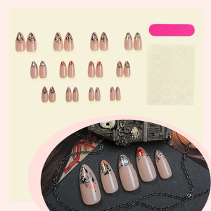 Halloween almond press-on nails with pumpkin and ghost patterns including 24pcs and tools