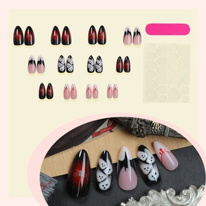 24pcs Halloween press-on nails featuring ghost and spider patterns with almond shape