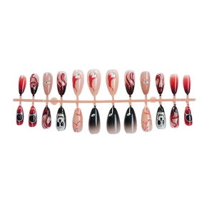 3D Halloween press-on nails featuring skull and blood designs in red, black, and white