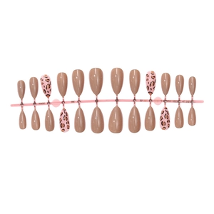 Almond shaped press-on nails featuring solid nude brown and classic leopard print patterns