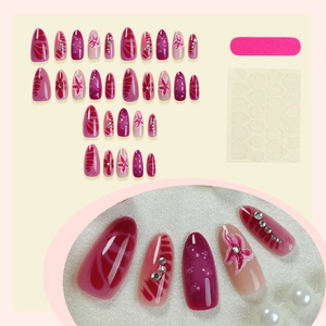 3D press-on nail kit with pink purple flowers, rhinestones, and seashell texture
