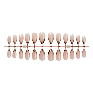 Long almond press-on nails with nude base, French leopard tips, and black accents
