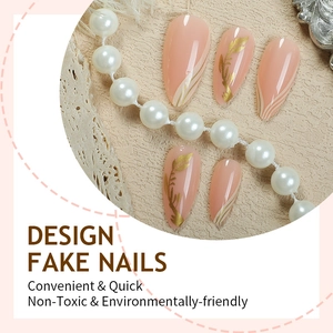 French nude almond fake nails with gold leaf patterns and pearl decorative accents