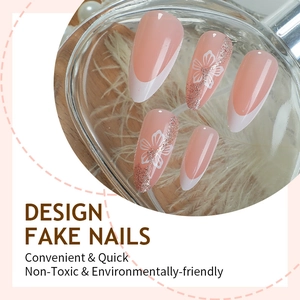 French almond press-on nails with white cherry blossom patterns and rose gold glitter