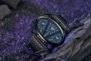 Detail of Oulm multi-dial quartz watch with black oval case and leather strap