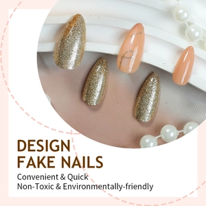 French almond press-on nails with nude glitter and golden wave lines, stiletto shape