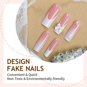 Pink gradient long coffin nails with white 3D bows and pearls in a French style set