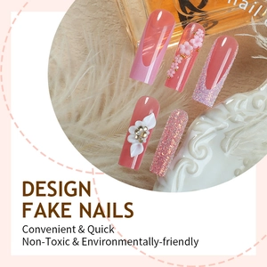 Elegant long coffin press-on nails with 3D floral designs and glitter accents