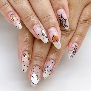 Halloween almond press-on nails with pumpkin ghost spider and bat art designs