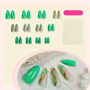 Set of 24 retro green French press-on nails with gold glitter wavy lines and tool kit