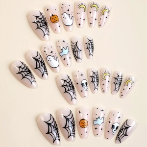 Halloween almond press-on nails with pumpkin, spider web, and ghost art designs