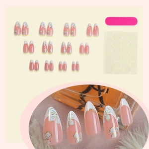 Almond French press-on nails with 3D floral patterns, file, and adhesive tabs set