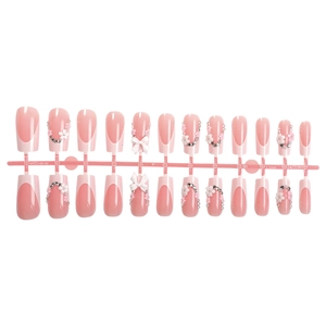 Pink and white gradient long coffin press-on nails with 3D bows and rhinestone charms