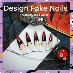Red and black cat-eye Halloween stiletto press-on nails with bat and blood designs