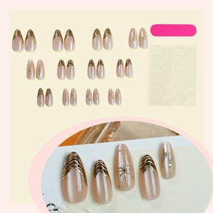 24pcs almond gold foil french press-on nails set with glitter cat eye and star rhinestones