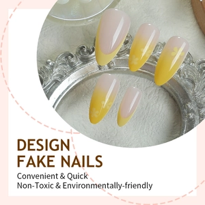 French tip almond press-on nails with yellow gradient and white flower patterns