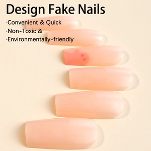 Halloween pink coffin press on nails featuring ghost spider web designs and matte finish