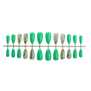 French tip press-on nails in neon green with gold glitter waves and almond shape