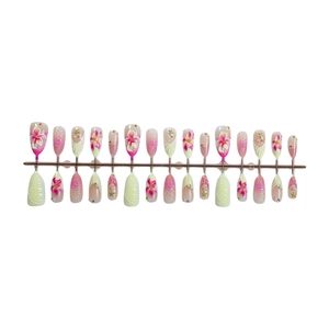 3D ocean-themed press-on nails with shell pearls and floral designs on pink gradient