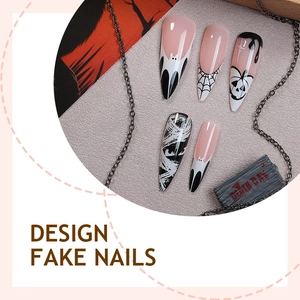 Halloween almond fake nails with pumpkin, bat, and spider web hand-painted designs
