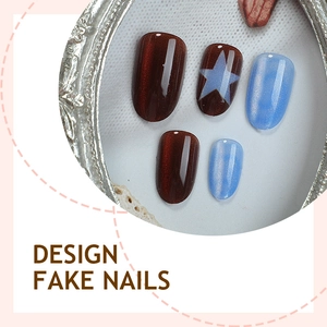 Short oval cat eye press-on nails with blue star patterns and glitter finish