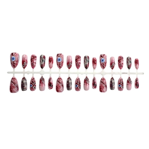 3D Halloween press-on nails set featuring almond shape with bloody eyeballs and stitches